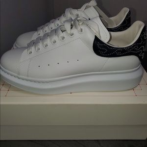White  Alexander McQueens sz 10.5 in MENS. SOLD